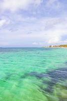 Tropical mexican beach full of people Playa del Carmen Mexico. photo