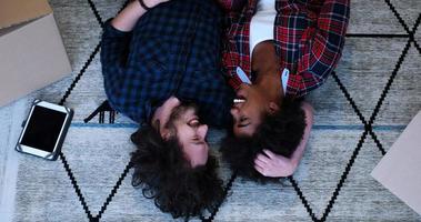 Top view of attractive young multiethnic couple photo