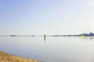 Atomic nuclear power station wadden sea tidelands coast landscape Germany. photo