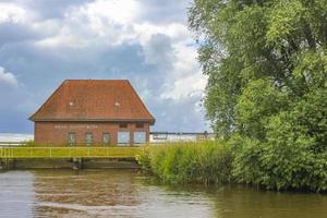 Beautiful natural landscape view panorama forest Oste river water Germany. photo