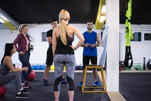 athletes getting instructions from trainer photo