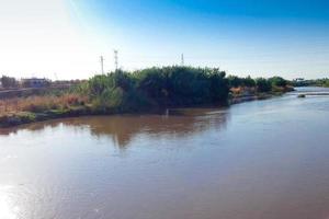 Llobregat River and the bridge that crosses the river at Sant Feliu de Llobregat photo