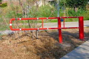 Metal gate that prevents the passage of pedestrians and sportsmen on rural roads. photo