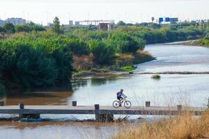 flood bridge to cross the river for sportsmen and sportswomen, both cycling, walking and running. photo