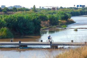 flood bridge to cross the river for sportsmen and sportswomen, both cycling, walking and running. photo