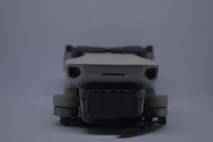 Drone quadcopter isolated with whte background. Selective focus and selective DOF photo