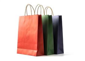 Colourful paper shopping bags on white background photo
