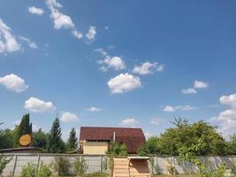 Summer clouds against the blue sky photo