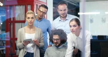 Startup Business Team At A Meeting at modern office building photo