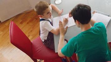 Boy doing homework photo