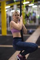 woman doing rope climbing photo