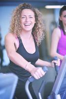 woman exercising on treadmill in gym photo