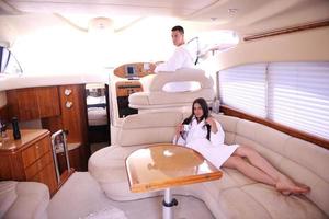 young couple on yacht photo