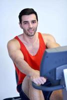 man running on the treadmill photo