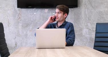 businessman working using a laptop in startup office photo