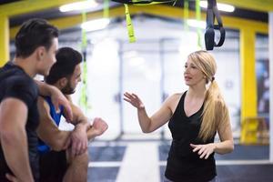 athletes working out  jumping on fit box photo