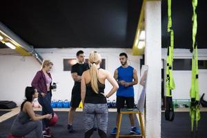 athletes getting instructions from trainer photo