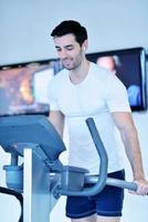 man running on the treadmill photo