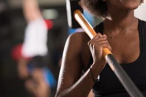 black woman after workout with hammer photo