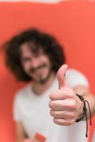 man with funny hair over color background with brush photo