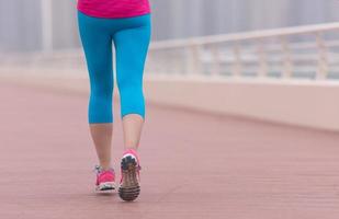 woman running on the promenade photo