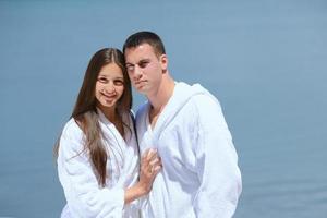 young couple on yacht photo