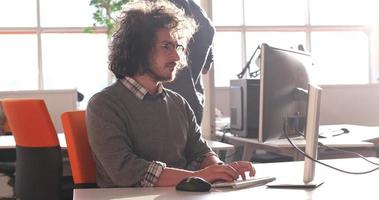 businessman working using a computer in startup office photo