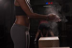black woman preparing for climbing workout photo