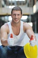 hard worker on construction site photo