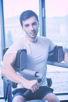 man running on the treadmill photo