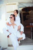 young couple on yacht photo