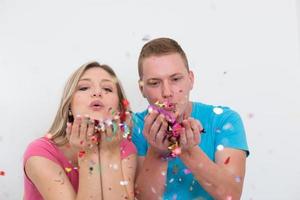 romantic young  couple celebrating  party with confetti photo