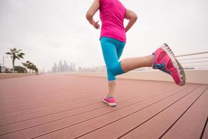 woman running on the promenade photo