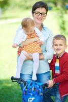 happy young family in park photo