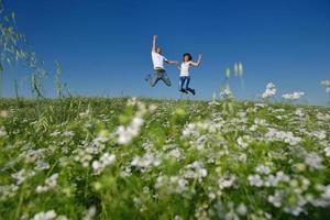 happy couple in wheat field photo