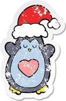 distressed sticker of a cute christmas penguin vector