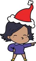 line drawing of a woman pointing wearing santa hat vector
