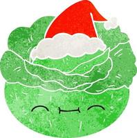 retro cartoon of a cabbage wearing santa hat vector