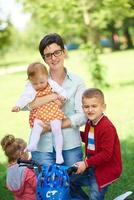 happy young family in park photo