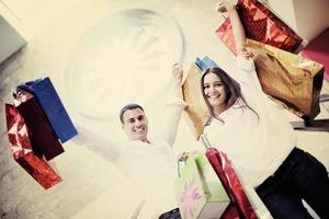 happy young couple in shopping photo