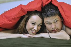 young couple in bed photo