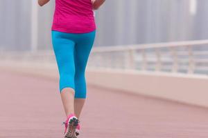 woman running on the promenade photo