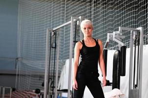 young woman practicing fitness photo