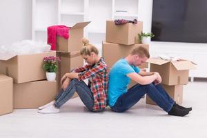 young couple moving  in new house photo