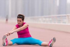 woman stretching and warming up photo