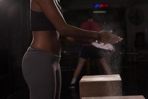 black woman preparing for climbing workout photo