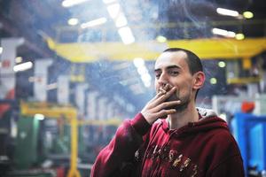 industry worker smoke cigarette photo