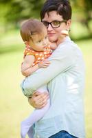 mother and baby in park photo