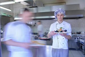 Chef in kitchen photo