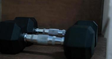 Hand weights on shelf photo